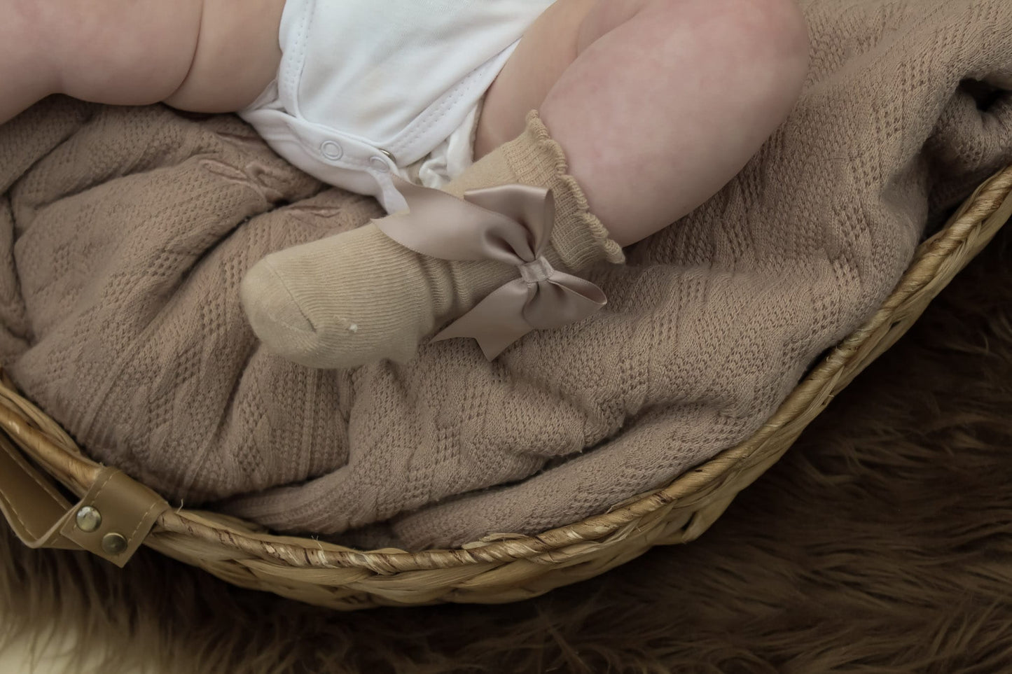 Brown cable knit baby blanket and taupe bow baby socks