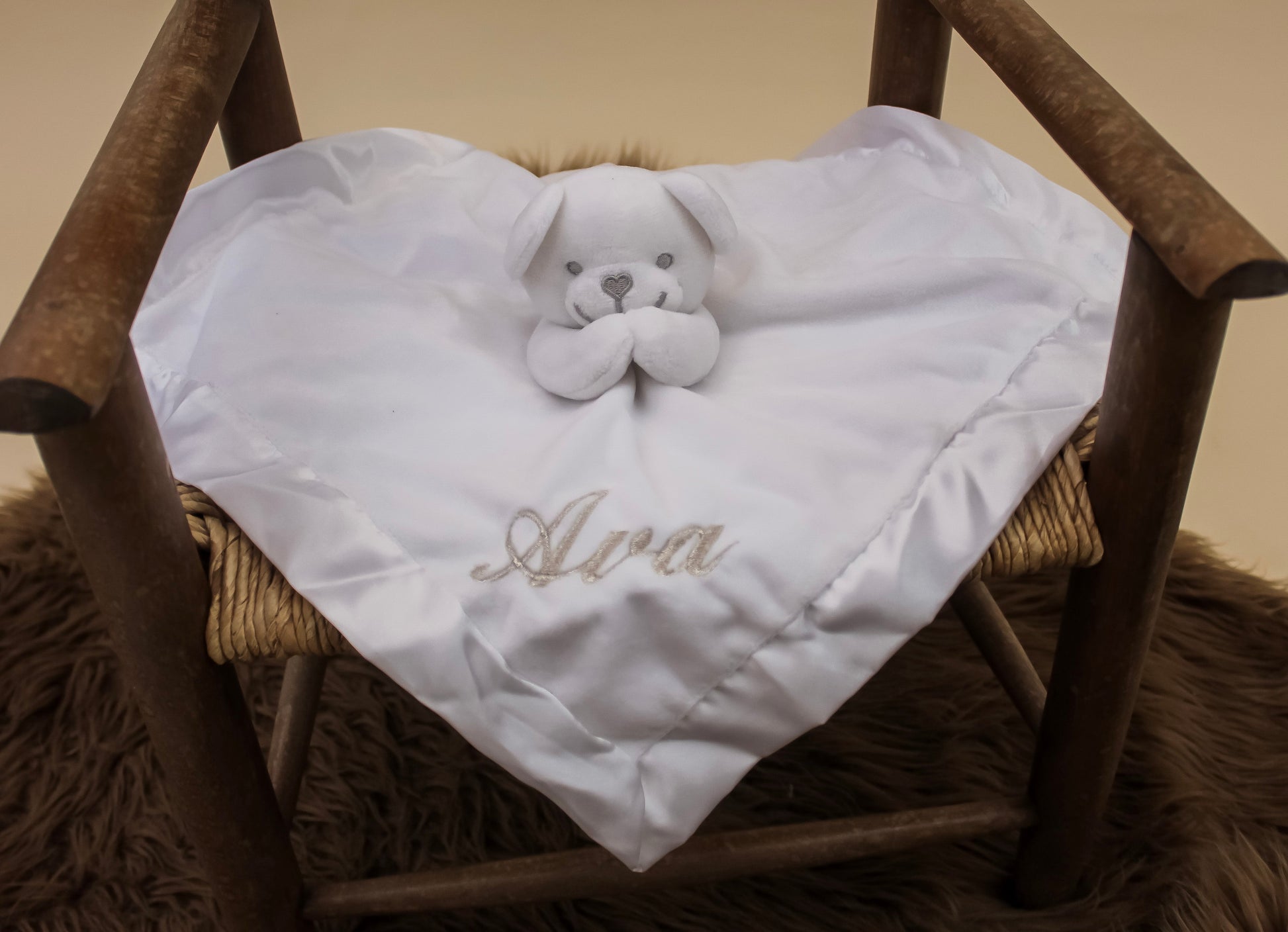 White embroidered bear baby comforter