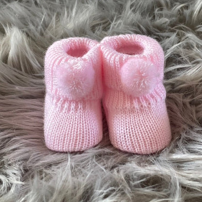 baby pink knitted pom pom baby booties