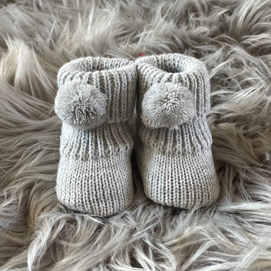 grey knitted pom pom baby booties