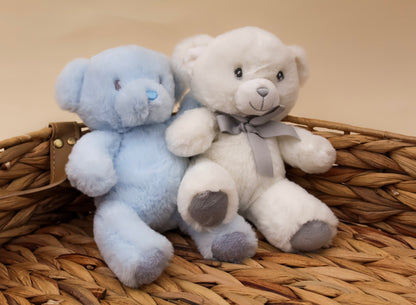 blue and white furry cuddly toy bear