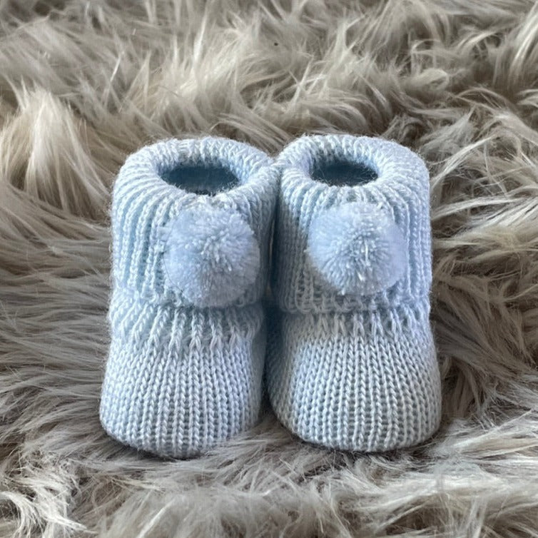 baby blue pom pom knitted booties