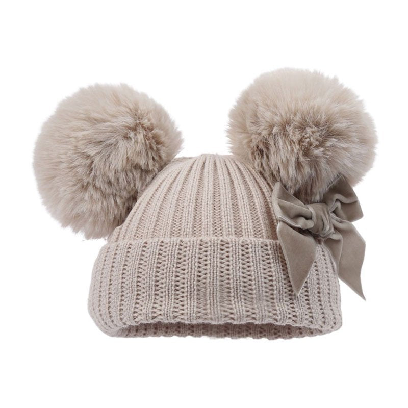 biscuit taupe ribbed baby hat with velvet bow detail