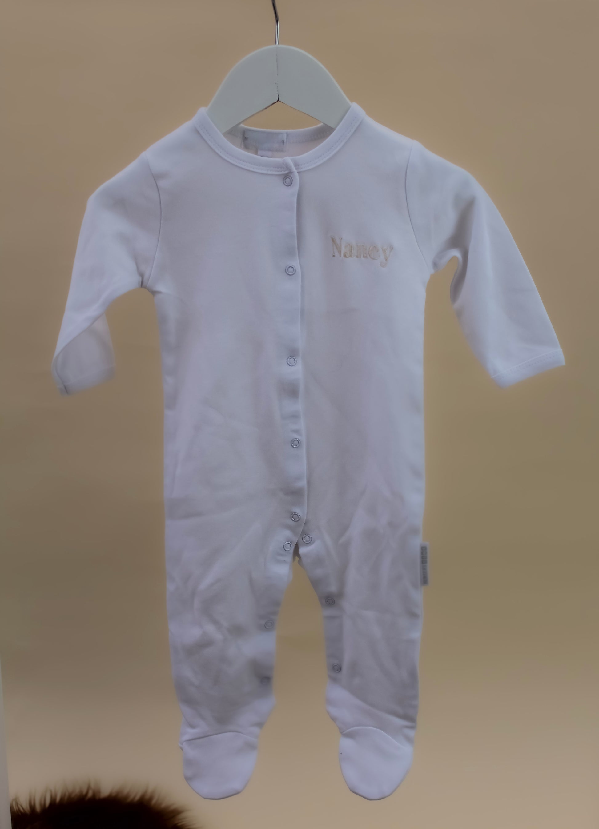 white embroidered baby pyjamas