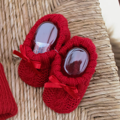 Red knitted knitted baby booties