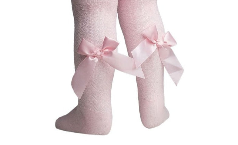 baby pink knitted tights with satin bow