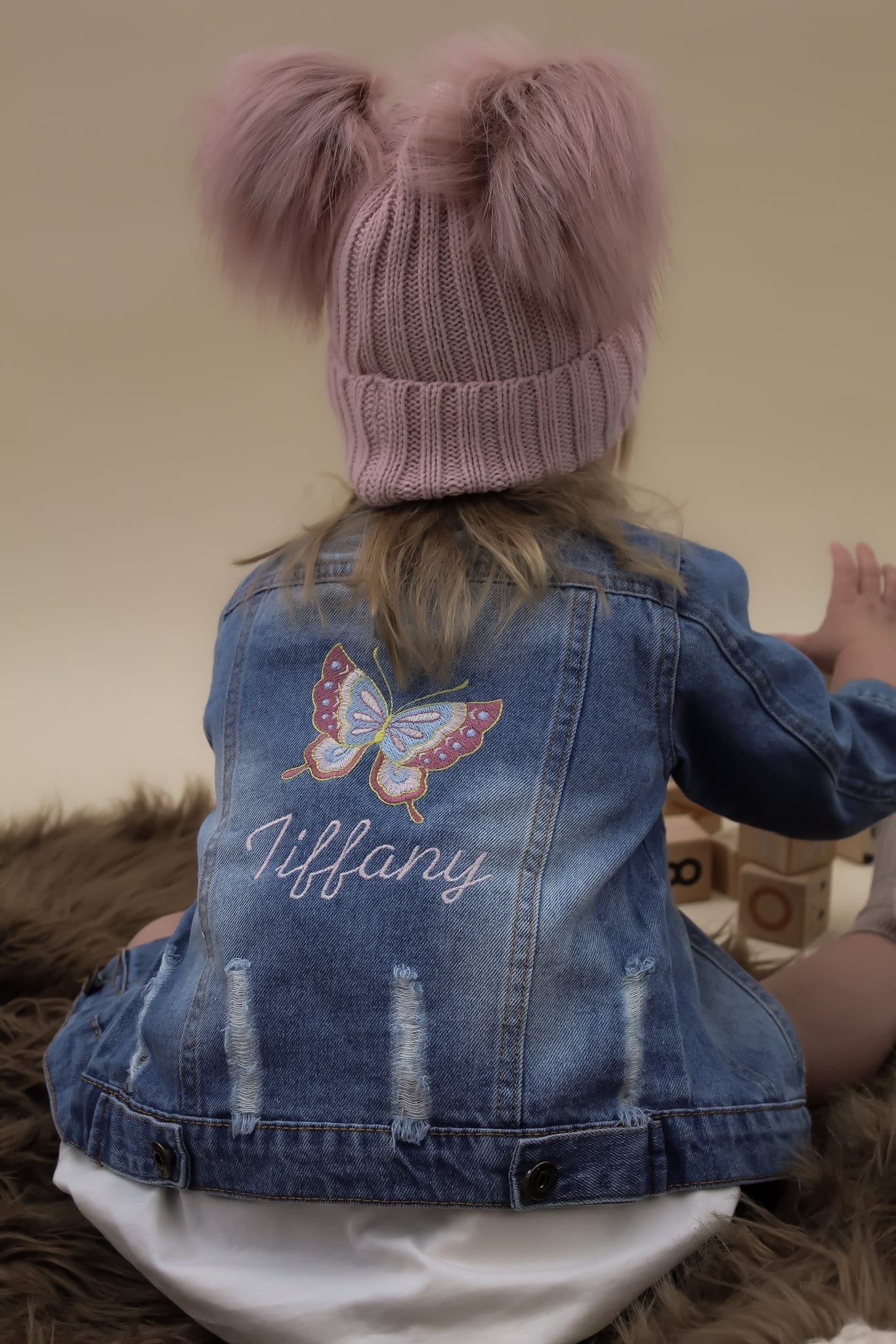 Rose Gold Knitted winter baby double pom pom hat with embroidered butterfly denim jacket